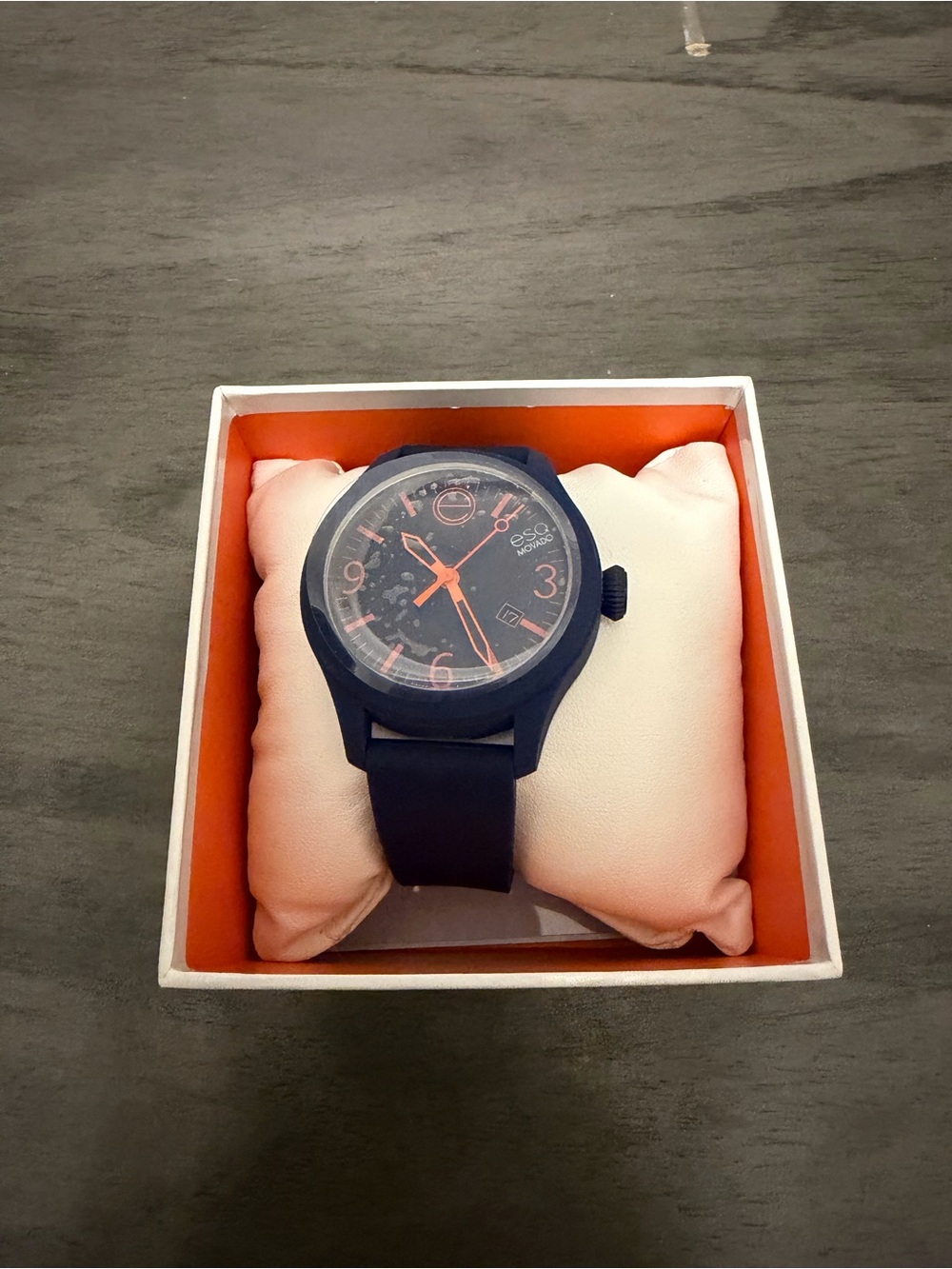 Movado Black Watch with Orange Accents
